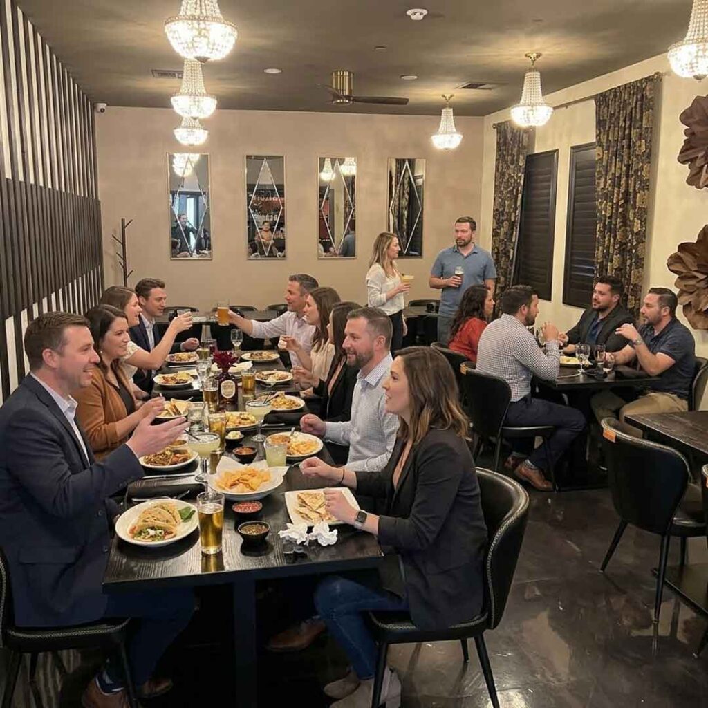 A group of people dining at tables in the Locos Bar & Cocina Swanson Location restaurant.